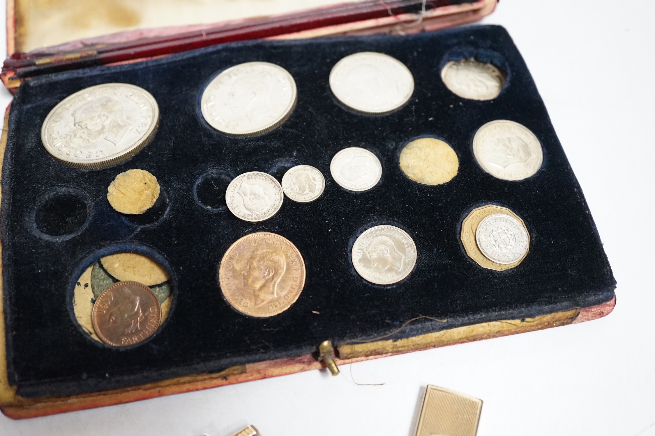 A 9 carat gold cigar cutter, silver pendant and a George VI specimen coin set a/f
